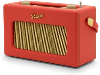 Radio Roberts Revival iStream 3L vista desde tres cuartos delanteros, carcasa rectangular en cuero sintético rojo con una gran rejilla metálica dorada en la parte frontal, logo Roberts a juego, dos botones color crema en la parte superior, asa integrada en la parte superior, antena telescópica y correa lateral con hebilla dorada.