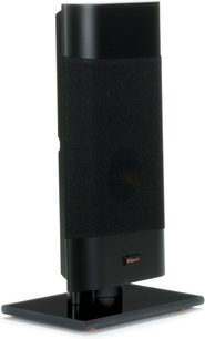 Coluna de parede Klipsch RP-140D preta, formato slim com grelha têxtil na parte frontal, vista de frente sobre base preta