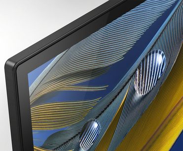Sony XR-77A80JAEP-tv, nærbillede af skærmen, der viser bølgede gule og blå linjer på sort baggrund