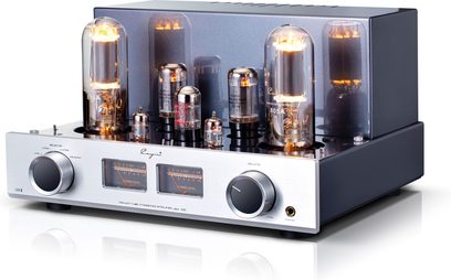 Cayin Jazz 100 silver stereo tube integrated amplifier, silver and dark gray brushed aluminum chassis, front panel with two orange VU meters, two black rotary knobs with silver rings and headphone jack, large glowing glass tubes on top, three-quarter front left view