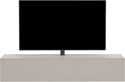 Mueble de audio y vídeo Spectral Core 40 beige claro, frontal depurado sin tiradores y televisor sobre soporte central negro
