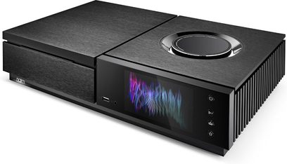 Naim Uniti Star høyttalersystem i svart, forfra, med skjerm som viser blå og lilla lydstråler