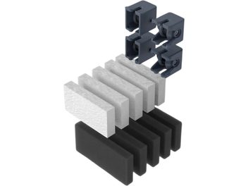 Complete HumminGuru maintenance kit with four gray holders and white and black rectangular blocks