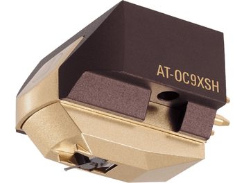 Gylden og brun Audio Technica AT-OC9XSH vinylpickup-enhed, set ovenfra i nærbillede, med diamant og pickupholder