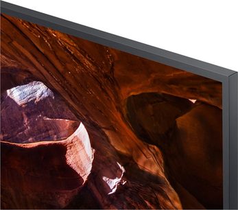 Televizor Samsung UE55RU7405 s plochou obrazovkou, tmavě šedým tenkým rámem, abstraktní hnědo-červený obraz s vlnkovou texturou a bílými odlesky