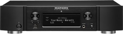 Marantz NA6006 netværksaudioafspiller i sort, set forfra, LCD-display, kontrolknapper og -hjul, USB-porte og hovedtelefonstik på forsiden