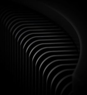 Linhas curvas concêntricas pretas sobre um fundo preto, formando um padrão abstrato que lembra ondas sonoras