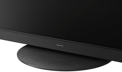 Panasonic TX-65HZ1500E tv, profilvisning, flad sort skærm, mat sort oval fod