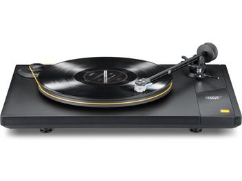 Black Mofi Electronics StudioDeck turntable with orange trim, tonearm and vinyl record