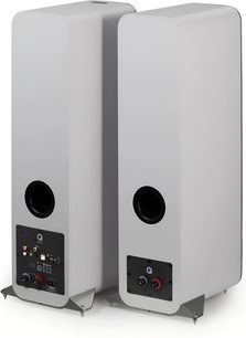 Set of 2 Q Acoustics M40 white wireless speakers, rounded-corner cabinets with matte finish, rear three-quarter view showing black circular port, lower connection panel, and metal spike feet