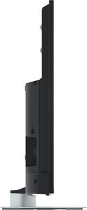TV-43W93AE6 Panasonic, set fra siden, sort fladskærm, rektangulær stander, slankt profil, synlige tilslutninger bagpå