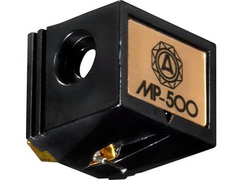Diamond stylus for Nagaoka JN-P500 turntable cartridge, small rectangular black case made of metal and plastic with a side mounting opening, beige front plate marked with logo and MP-500, visible metallic stylus tip, three-quarter view