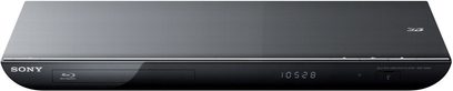 Sony BDP-S590 4K Blu-ray-afspiller, set forfra, aflang rektangulær sort form, blank frontpanel med knapper og digitalt display