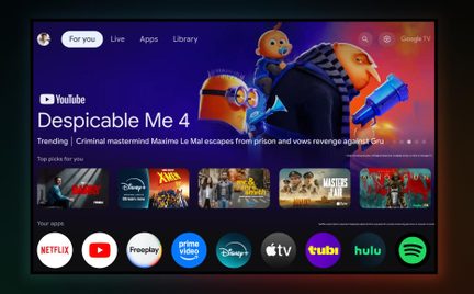 Google TV digitale Benutzeroberfläche, Vorderansicht, violetter Hintergrund mit Despicable Me 4-Banner und Streaming-App-Symbolen