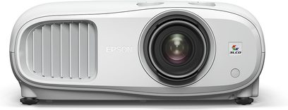 Epson EH-TW7000 white video projector, front view, centered lens, side ventilation grilles, 3LCD logo