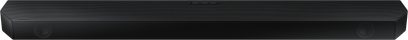 Rektangulær, langstrakt sort Samsung HW-Q60B/ZF soundbar, set forfra, med metalrist over hele overfladen