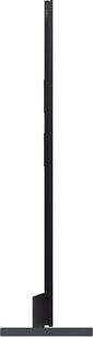 TCL 115C7K Ultra-HD-Fernseher in Schwarz, ultraschlankes Metallgehäuse, auf rechteckigem Standfuß montiert, Seitenansicht