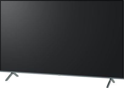Panasonic TV-65W95AEG højdefinitionsfjernsyn, sort skærm, set forfra, V-formede metalben, let skrå synsvinkel