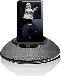 Black circular JBL On Stage Micro II docking station with central speaker, iPod screen displaying a man pointing a firearm