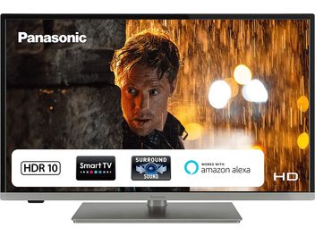 Televizor Panasonic TX-32JS360E HD, obrazovka zobrazující muže osvětleného ve tmě za deště, loga Smart TV a Surround Sound