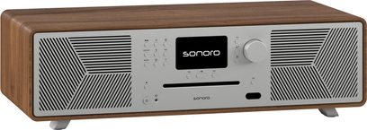 Sonoro "alt i én" hi-fi-system, model Meisterstück (gen 2) valnød - sølv, set forfra, centralt display, knapper og drejeknap til højre, ventilationsåbninger med geometriske mønstre til venstre og højre, metalfødder