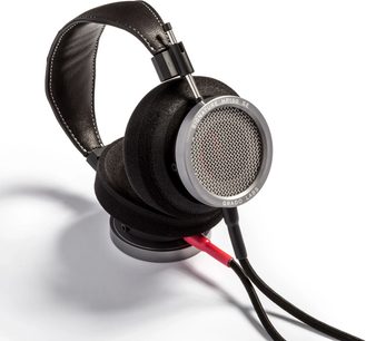 Atvērta tipa vadu hi-fi austiņas Grado HP100 SE ar melnu ādas galvas stīpu, apaļām putu ausu spilventiņiem un sudraba metāla režģi