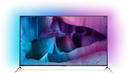 Philips 65PUS7120 tv set forfra, slukket skærm der viser abstrakte former i blå og lilla farver