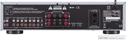 Denon PMA-500AE hi-fi stereo amplifier, rear view, audio and speaker connectivity, impedance selector, power outlets and switch