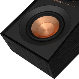 Enceinte Klipsch R-40SA noire, vue de dessus en gros plan, haut-parleur rond cuivré au centre dans un boîtier carré