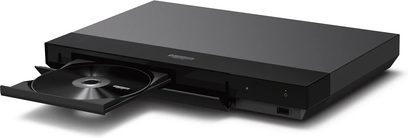 Sony UBP-X700K 4K Blu-ray-spiller svart med åpen diskbrett, perspektivvisning, synlige knapper og porter
