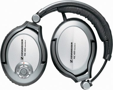 Sennheiser PXC-450 åbne over-ear hovedtelefoner i grå og sort, set fra venstre side, med hovedbøjle og ørepuder i læder