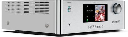 Integrert stereo hi-fi forsterker Rotel RAS-5000, trekvart visning, sølvfarget front, sirkulær volumknapp, sentralt display