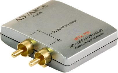 Trådløs audio-sender Advance Paris WTX-700 i sølvfarvet metal, set ovenfra, med to forgyldte stik på højre side