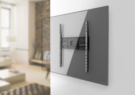 Support mural pour TV en métal noir et gris, rails verticaux perforés et plaque centrale, vue de trois-quarts arrière
