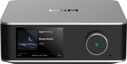Omrežni avdio predvajalnik WiiM Ultra srebrne barve z zaslonom, ki prikazuje "Sleep Music", okroglim gumbom s svetlečim trikotnikom in pravokotnim ohišjem