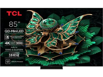 TCL 85C7K sort højopløsnings-tv med slank metalramme og diskret centralt fod, flad 85-tommers skærm, der viser en smaragdgrøn illustration og teknisk tekst til venstre, set forfra