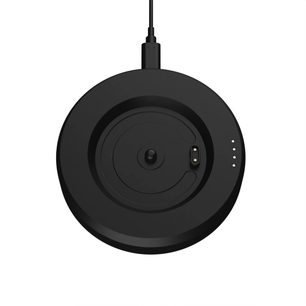 Sort rund base til HumminGuru Lumi-pladevægten, set ovenfra med kabel og to gyldne kontakter