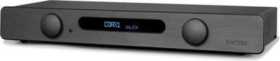 Audio převodník DAC Atoll Electronique DAC300 černý, pohled zepředu, dva otočné knoflíky, centrální displej s nápisem "COAX1 UNLOCK"
