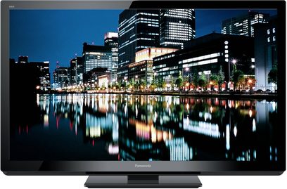 Panasonic TX-P42GT30 fladskærms-TV, der viser et natligt vue af oplyste skyskrabere og deres spejlinger i vandet