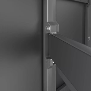 Vogel's Elite TVM 5645 zwarte tv-muurbeugel, close-up van het scharnier van de arm achter de televisie