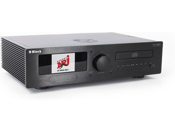 All-in-one hi-fi system Block CVR-100+ MKIII in black brushed aluminum, three-quarter front left view, front panel featuring a large color display, a wide volume knob, a CD tray, and a row of buttons, with side ventilation fins