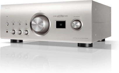 Integrert stereo hi-fi forsterker Denon PMA-3000NE sølv, trekvart visning, sirkulære knapper, sentralskjerm, svarte føtter