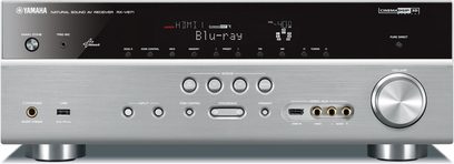 Yamaha RX-V671 titan hjemmebiograf-forstærker, set forfra, sølvfarvet front med knapper, stik og blåt digitalt display