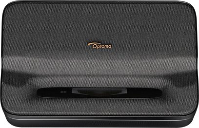 Optoma Photon Go-projektor set forfra, sort tekstureret overflade, centralt placeret gyldent logo, rektangulær åbning nederst