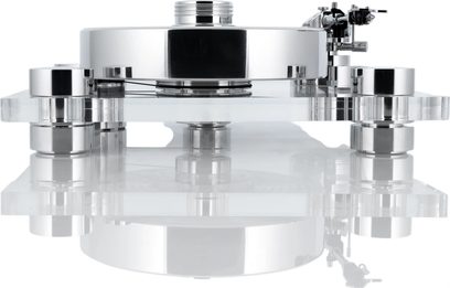 Transrotor Bellini RB330 hi-fi pladespiller i blank krom og transparent akryl, set forfra, med poleret cirkulær pladetallerken, dobbelt klart chassis og cylindriske metalfødder, tonearm monteret til højre