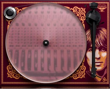 Hi-fi pladespiller Essential III George Harrison, set ovenfra, gennemsigtig cirkulær pladetallerken, sort tonearm, rød dekoreret sokkel