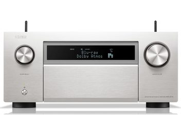 Ampli home-cinéma Denon AVC-A1H argent, vue de face, affichage bleu, deux boutons rotatifs argentés de part et d'autre