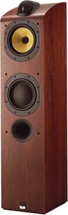 Bowers & Wilkins 704 gulvhøjttaler i mørkt træ, set forfra, med to runde højttalere og en gul diskant