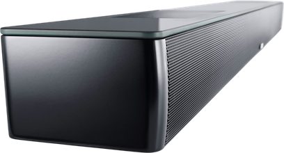 Sort højglans Canton Smart Soundbar 10, set skråt fra siden, front med metalgitter og top i glas