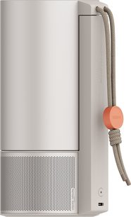 Videoproiettore XGIMI MoGo 3 Pro, vista laterale, superficie liscia, griglia perforata, pulsante circolare, cavo intrecciato beige